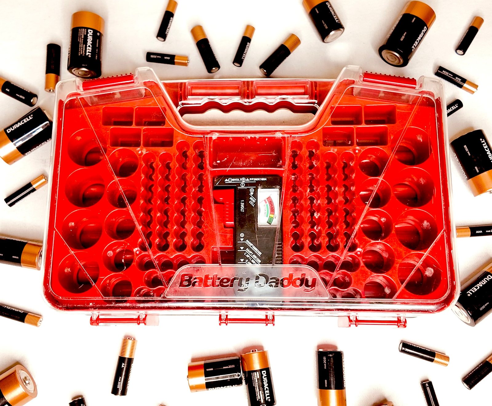 Battery storage organizer laid out flat with batteries around it